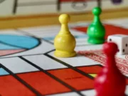 Game Designer Nick Bentley Asks – Why, Oh Why, Don’t You Like Board Games Pawns and dice in a board game.