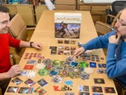 Funforge Doubles Down on US and Canada with Flat River Group Funforge designers playing Monumental.