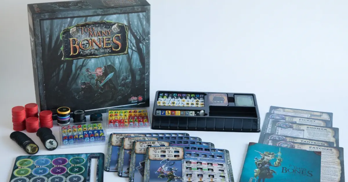 The components and game box for Too Many Bones.
