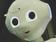 AI Can One Day Design Magic: The Gathering, Head Designer Claims AI robot that is looking back at people.