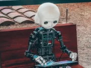 Hasbro to Bring AI and Interactive Digital System to Board Games An AI playing at a tablet.